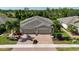 Aerial view of a two-car garage home at 13458 Abercrombie Dr, Englewood, FL 34223