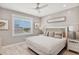 Comfortable bedroom with coastal accents and plenty of natural light at 149 Mckinley Dr, Sarasota, FL 34236