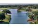 Golf course with winding waterways and lush green fairways at 7724 Alister Mackenzie Dr, Sarasota, FL 34240