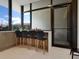 Kitchen counter with stools and window view at 1542 4Th St # 212, Sarasota, FL 34236