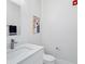 Modern bathroom with white vanity and toilet at 1542 4Th St # 212, Sarasota, FL 34236