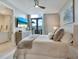 Spacious main bedroom with a comfortable bed and private balcony access at 1542 4Th St # 212, Sarasota, FL 34236