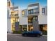 Modern building exterior with blue car parked at 1542 4Th St # 212, Sarasota, FL 34236