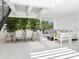 Private patio with dining and seating area, perfect for outdoor relaxation at 1542 4Th St # 212, Sarasota, FL 34236