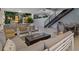 Outdoor entertainment area with seating, dining, and fire pit at 1542 4Th St # 212, Sarasota, FL 34236