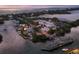 Aerial view of a drawbridge and surrounding waterfront area at 207 Woodland Dr # 207, Osprey, FL 34229