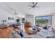 Spacious living area with comfortable seating and hardwood floors at 207 Woodland Dr # 207, Osprey, FL 34229
