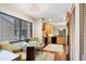 Cozy kitchen nook with glass-top table and chairs, perfect for casual dining at 207 Woodland Dr # 207, Osprey, FL 34229