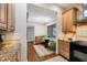 Bright kitchen nook with a small table and chairs, adjacent to kitchen at 207 Woodland Dr # 207, Osprey, FL 34229