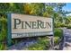 PineRun community entrance sign; No trespassing at 207 Woodland Dr # 207, Osprey, FL 34229