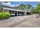 Covered carport parking for residents at 207 Woodland Dr # 207, Osprey, FL 34229