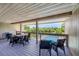 Outdoor patio furniture with scenic water views at 207 Woodland Dr # 207, Osprey, FL 34229
