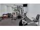 Well-equipped fitness center with weight machines and cardio equipment at 207 Woodland Dr # 207, Osprey, FL 34229