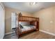 Bedroom with bunk bed, nightstand, and window blinds at 3658 Spinner Ave, North Port, FL 34286