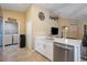 Modern kitchen with stainless steel appliances and white cabinets at 3658 Spinner Ave, North Port, FL 34286