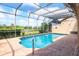 Relaxing screened pool and patio with tranquil views at 7738 Calle Facil, Sarasota, FL 34238