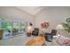 Relaxing living room with access to a screened patio at 4440 Calle Serena, Sarasota, FL 34238