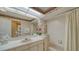 Clean bathroom with tub and shower combination at 4440 Calle Serena, Sarasota, FL 34238