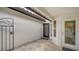 Front entry with tile flooring and access to interior rooms at 4440 Calle Serena, Sarasota, FL 34238