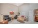 Spacious living area with comfortable seating and large windows at 4440 Calle Serena, Sarasota, FL 34238