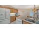 Well-equipped kitchen featuring granite countertops and stainless steel appliances at 4440 Calle Serena, Sarasota, FL 34238