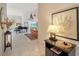 Bright and spacious entryway with tile floors, piano and dining area view at 4440 Calle Serena, Sarasota, FL 34238