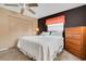 Bright bedroom with a comfortable bed and ample closet space at 1255 Lincoln Dr, Englewood, FL 34224