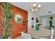 Open concept dining area with a view of the lanai at 1255 Lincoln Dr, Englewood, FL 34224