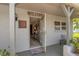 Inviting front entrance with a welcome mat at 1255 Lincoln Dr, Englewood, FL 34224