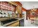 Updated kitchen with a view of the golf course at 1255 Lincoln Dr, Englewood, FL 34224