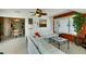 Sunroom with comfortable seating and views of the backyard at 1255 Lincoln Dr, Englewood, FL 34224