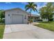 Single car garage with driveway at 1255 Lincoln Dr, Englewood, FL 34224