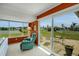 Sunroom with sliding doors leading to the backyard at 1255 Lincoln Dr, Englewood, FL 34224