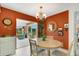 Bright dining room with view of the water and patio at 1255 Lincoln Dr, Englewood, FL 34224
