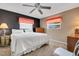 Main bedroom with a king-size bed and neutral decor at 1255 Lincoln Dr, Englewood, FL 34224