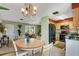 Dining area with kitchen and living room access at 1255 Lincoln Dr, Englewood, FL 34224