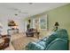 Spacious living room featuring ample natural light at 1255 Lincoln Dr, Englewood, FL 34224