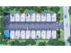 Aerial view showing parking layout with 16 numbered units and a car wash at 6562 Palmer Park Cir # 7, Sarasota, FL 34238