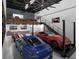 Upscale garage with car lift and loft area for added storage and entertainment at 6562 Palmer Park Cir # 7, Sarasota, FL 34238