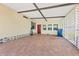 Covered patio with brick pavers and access to home at 1508 45Th E Ave, Ellenton, FL 34222