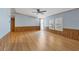Living room with wood-look laminate flooring at 1508 45Th E Ave, Ellenton, FL 34222