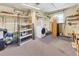 Workshop area with shelving, workbench, and washer at 1508 45Th E Ave, Ellenton, FL 34222