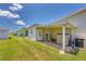 Home exterior with covered patio and storage shed at 1508 45Th E Ave, Ellenton, FL 34222