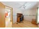 Bright home office features wood flooring and built-in desk at 1508 45Th E Ave, Ellenton, FL 34222