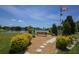 Serene lakefront park with a memorial bench at 1508 45Th E Ave, Ellenton, FL 34222