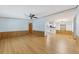 Open dining room with wood flooring and kitchen access at 1508 45Th E Ave, Ellenton, FL 34222