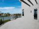 Spacious balcony overlooking the water, offering stunning views and a relaxing outdoor space at 3550 Flamingo Ave, Sarasota, FL 34242