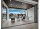 Waterfront balcony with outdoor furniture overlooking the water, offering a scenic view at 3550 Flamingo Ave, Sarasota, FL 34242