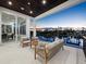 Outdoor balcony features sunset views, comfortable seating and views of the intercoastal at 3550 Flamingo Ave, Sarasota, FL 34242