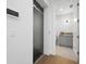 Modern elevator near an entry to a bathroom with a sleek door and clean design at 3550 Flamingo Ave, Sarasota, FL 34242